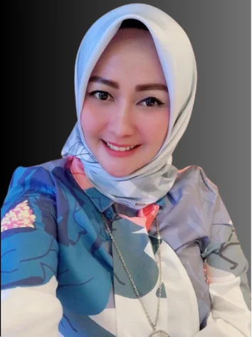 Dr. Hj. Aris Yulia, S.H., M.Kn. professional portrait